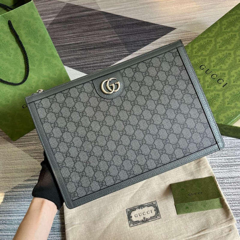 G*u*i clutch bags